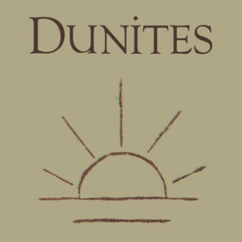 Dunites Albariño Islay Vineyard 2020 label; Gold label with dark block text and dark line drawing of a sinking sun