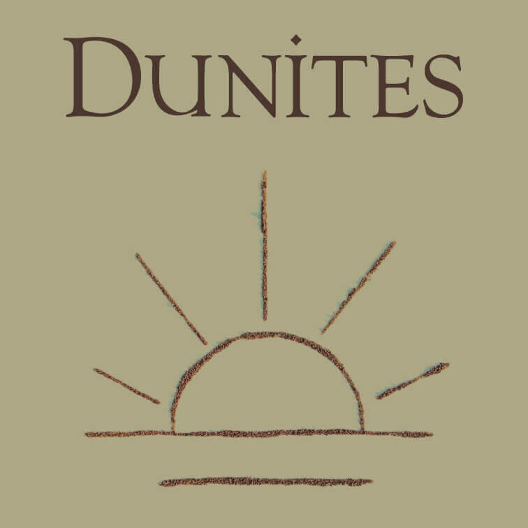 Dunites Albariño Islay Vineyard 2020 label; Gold label with dark block text and dark line drawing of a sinking sun