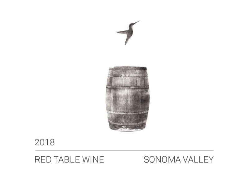 DORIS Red Table Wine 2018; White, square, rectangular label showing a wooden wine cask with the silhouette of a bird in flight above, Black text.