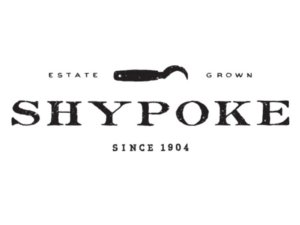 Very elegant white rectangular label with back text across the centre, and showing an image of a gardener's harvesting sickle
