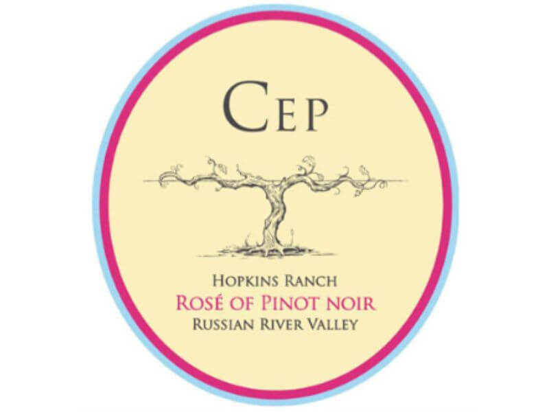 CEP Hopkins Ranch Rosé Pinot Noir 2020;An oval beige label with pink border, with black line drawing of a grapevine and text in black & pink