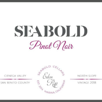 Seabold Eden Drift Pinot Noir 2018; A black bordered white rectangular label. Dark grey and purple text towards the top. Two lines of grey text towards the bottom, divided horizontally by a purple separator. The text is separated further by a circle of grey text in the middle, with more grey text inside the circle.