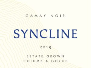 Syncline Gamay Noir 2019; Rectangular cream coloured label, mainly black text, 'Syncline' across the middle in deep blue