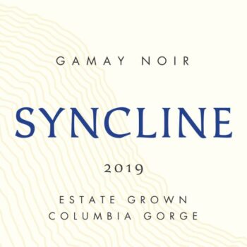 Syncline Gamay Noir 2019; Rectangular cream coloured label, mainly black text, 'Syncline' across the middle in deep blue