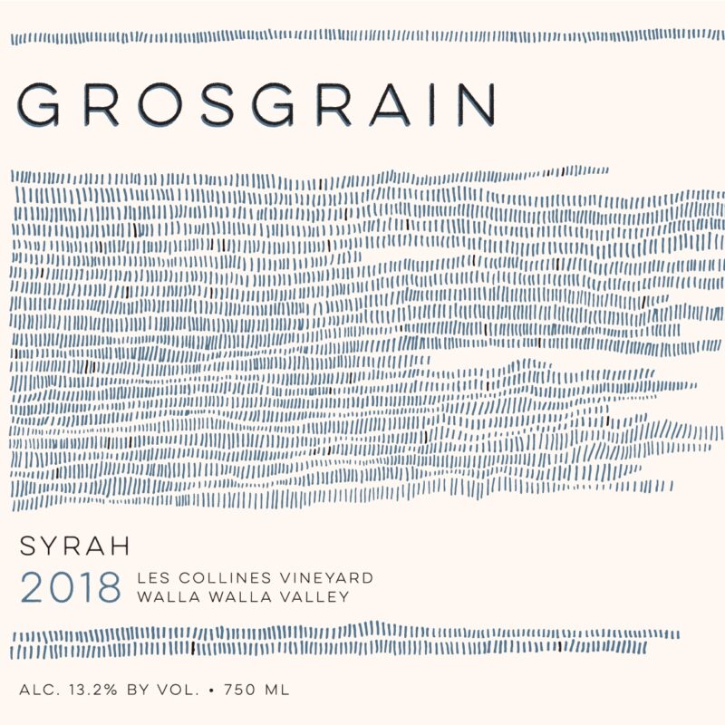 Grosgrain Les Collines Syrah 2018 label; A beige label with wavy horizontal stripes of various lengths, all beginning on the left.